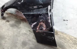 Крылья для BMW 7er 2008 года на фотографиях