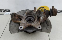 Кулак поворотный левый для Mitsubishi Pajero на фотографиях