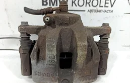 Суппорт передний левый для Suzuki Grand Vitara на фотографиях