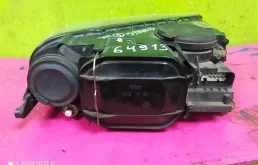 Фара ксенон левая для Volkswagen Touareg 2003 года на фотографиях