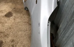 Крыло правое для Toyota Corolla 2009 года на фотографиях