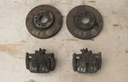 Суппорт задний правый для Mazda CX 5 2015 года на фотографиях