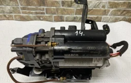 Компрессор пневмоподвески задний для Audi Q7 на фотографиях