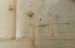 Расширительный бачок радиатора для Opel Astra 2015 года на фотографиях