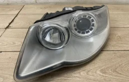 Фара левая (7L6941039C) для Volkswagen Touareg I (7L) 2002-2010