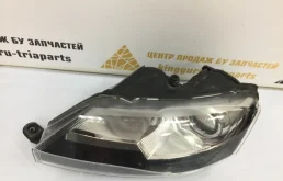 Фара ксенон левая для Skoda Rapid 2014 года на фотографиях