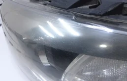 Фара ксенон левая для Audi Q7 2011 года на фотографиях