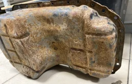 Поддон картера для Mitsubishi Outlander 2005 года на фотографиях