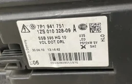 Фара ксенон левая для Volkswagen Touareg 2011 года на фотографиях